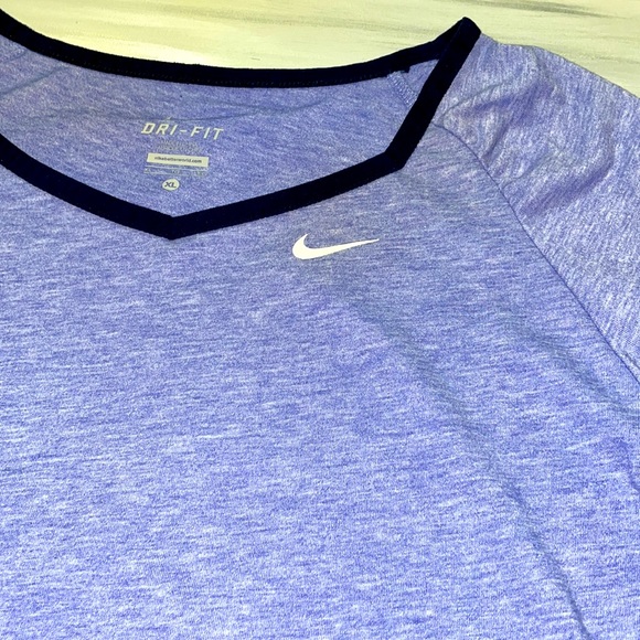 Nike short sleeved dri-fit women’s XL fits like a large. - Picture 5 of 9